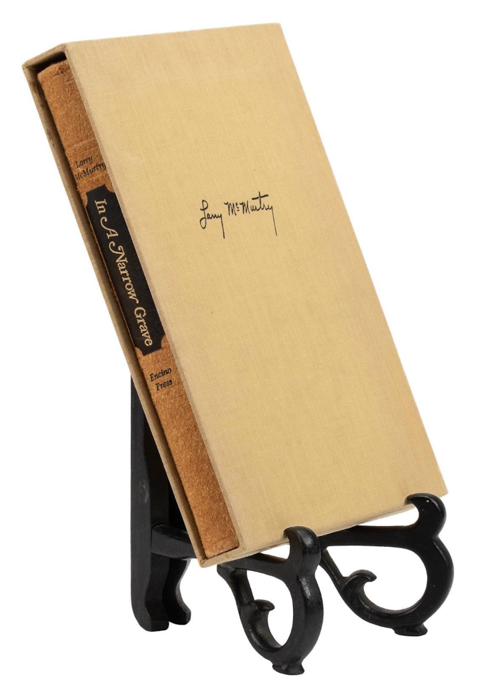 A signed first edition of his slim In a Narrow Grave: Essays on Texas, 1968