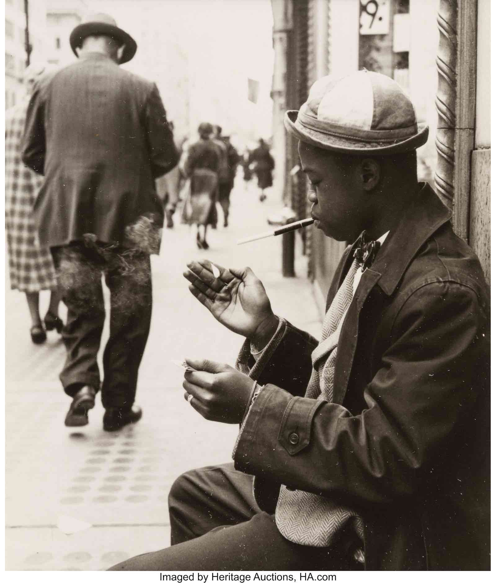 Smoking in the street, circa 1955