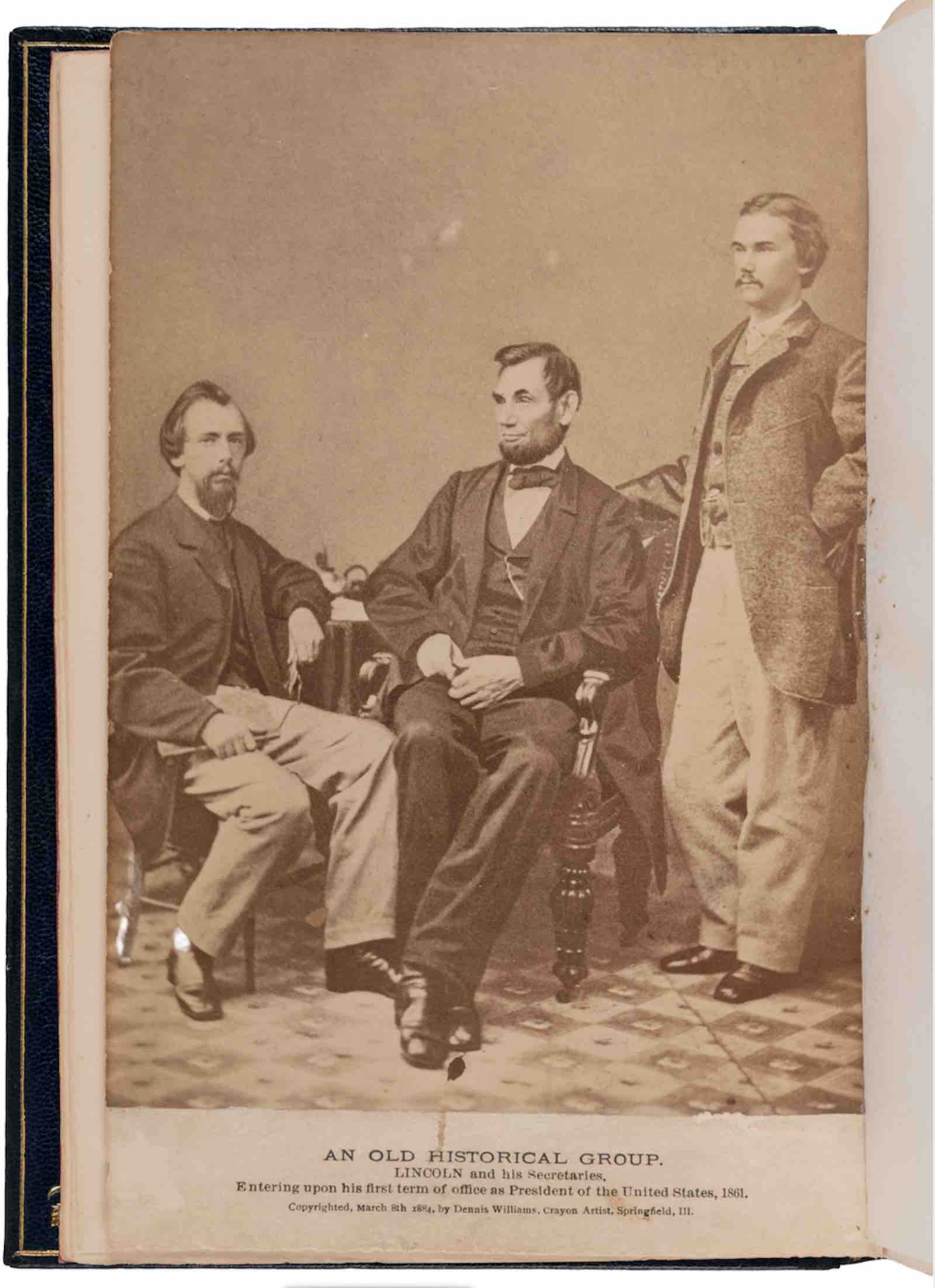 cabinet-size albumen print of President Lincoln with Secretaries Nicolay and Hays by photographer Alexander Gardner